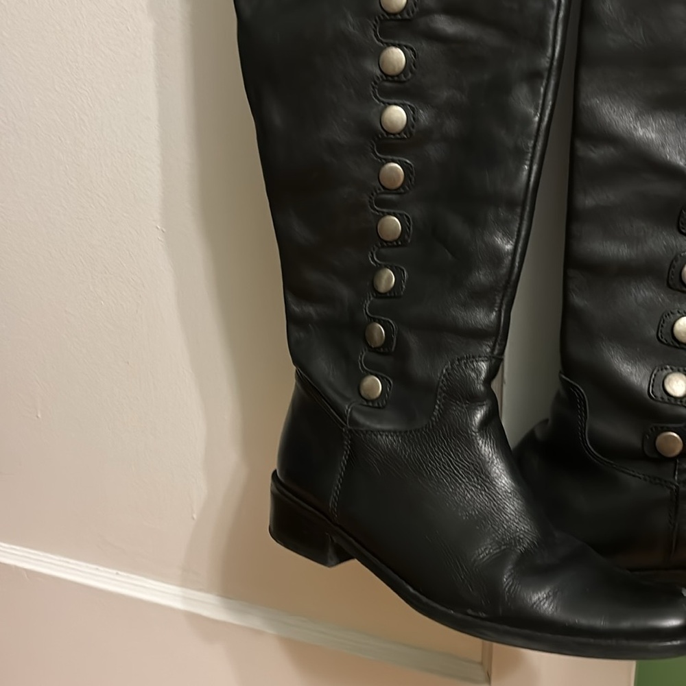 Over the knee black boots with button detail in excellent condition.